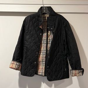 Burberry black  jacket with traditional plaid lining